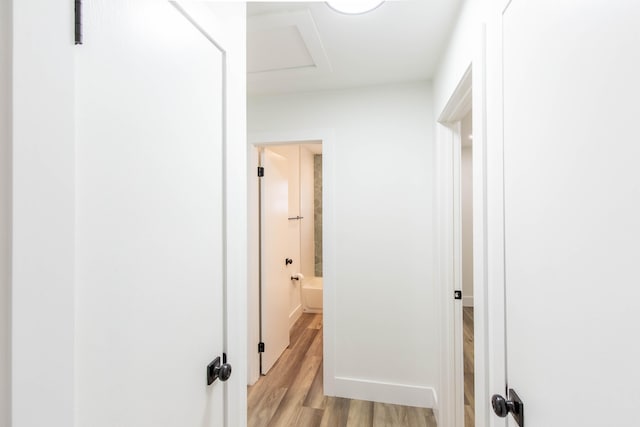 hallway featuring light hardwood / wood-style floors