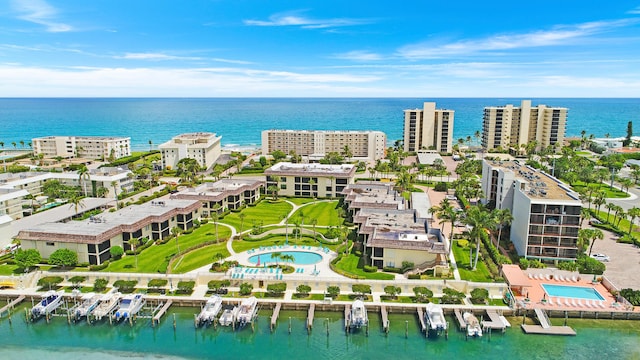 birds eye view of property featuring a water view