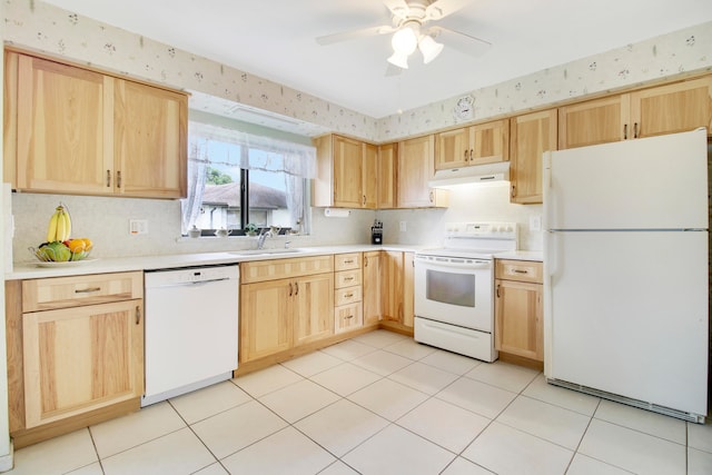 kitchen featuring ceiling fan, light tile patterned floors, sink, white appliances, and light brown cabinetry