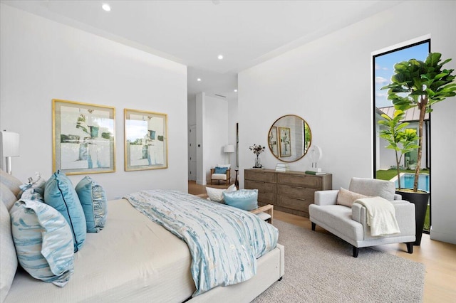 bedroom with light hardwood / wood-style flooring