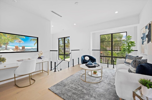 224 Edmor Rd, West Palm Beach, FL 33405 - living room with wood finished floors, healthy amount of natural light, and recessed lighting