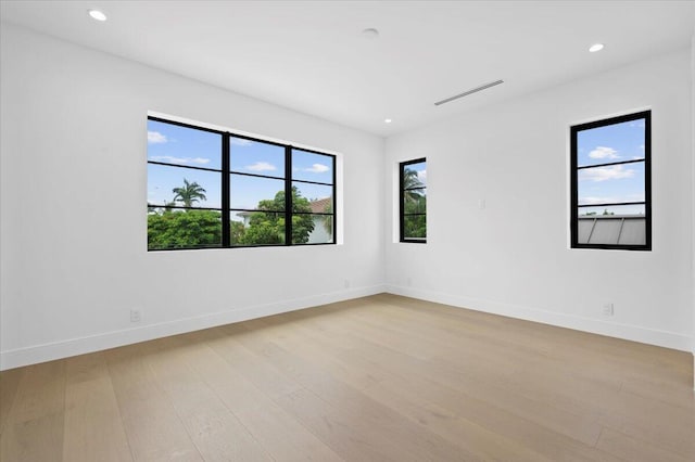 empty room with light wood-type flooring