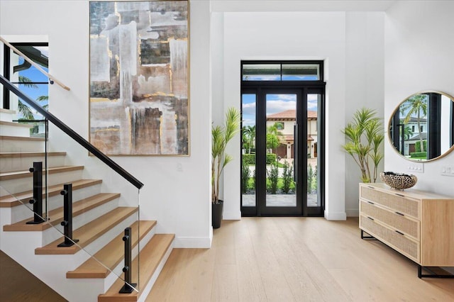 entrance foyer with light hardwood / wood-style flooring