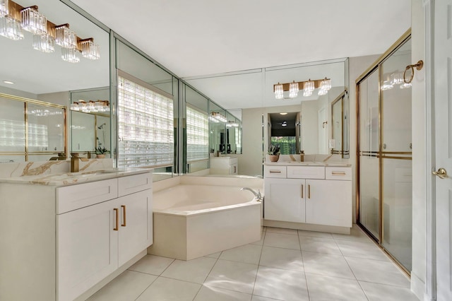 bathroom with vanity, plus walk in shower, and tile patterned floors