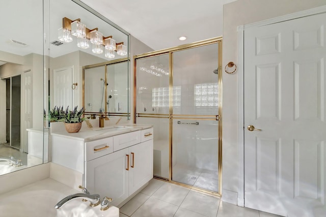 bathroom with vanity, plus walk in shower, and tile patterned flooring