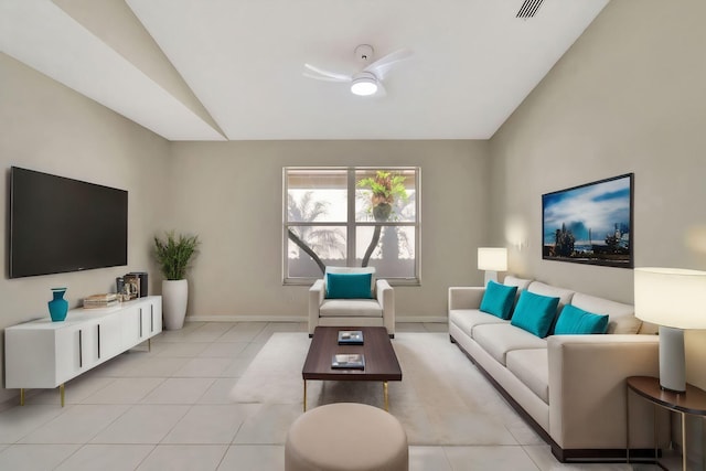 living room featuring light tile patterned floors, visible vents, ceiling fan, and vaulted ceiling