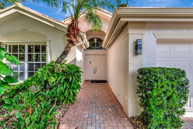 property entrance featuring a garage