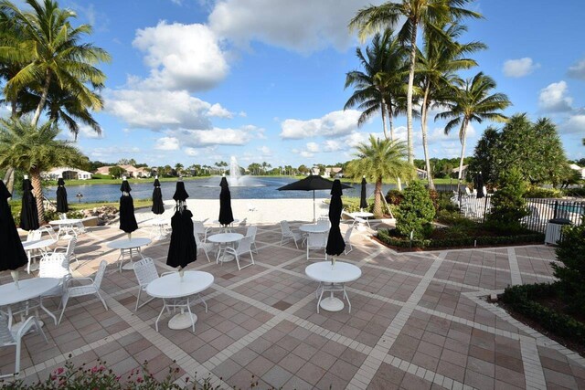 7893 Stanza St, Boynton Beach, FL 33437 - view of patio / terrace with a water view