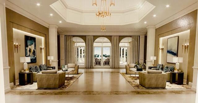 7893 Stanza St, Boynton Beach, FL 33437 - community lobby featuring ornamental molding and recessed lighting