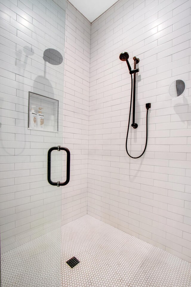 bathroom featuring an enclosed shower