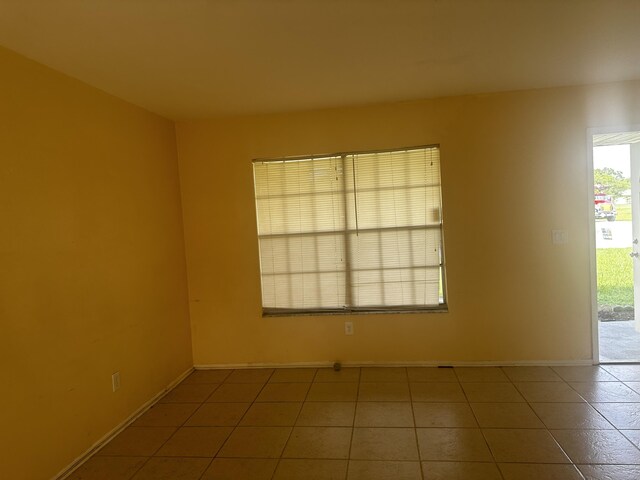 view of tiled spare room