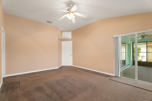 carpeted empty room with lofted ceiling and ceiling fan