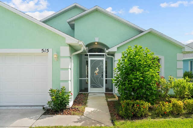 entrance to property with a garage