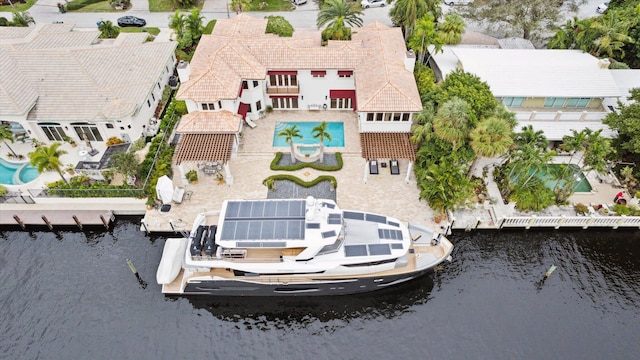 birds eye view of property featuring a water view