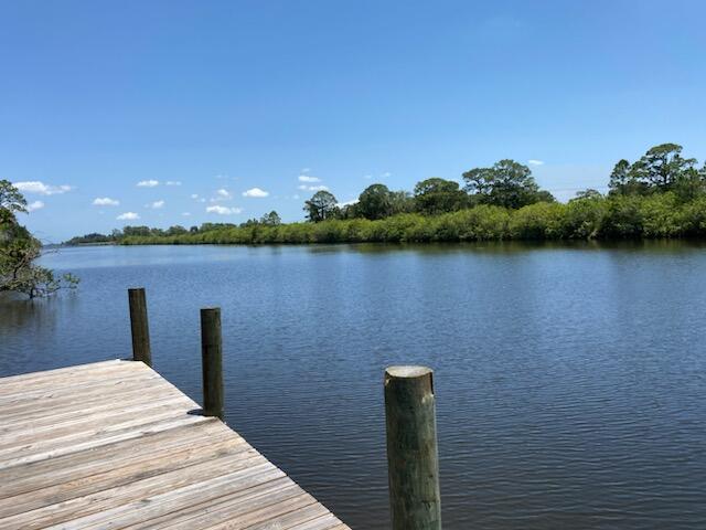 view of dock with a water view