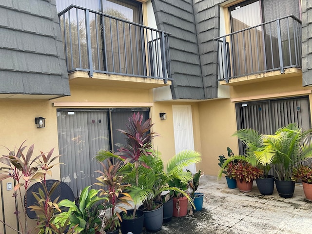 doorway to property with a balcony