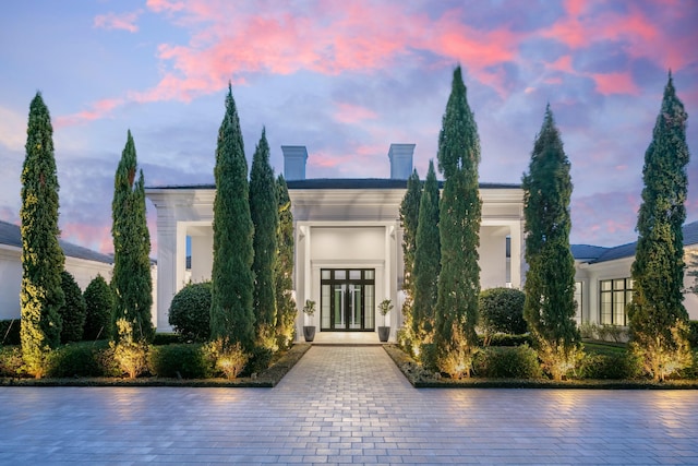 view of front facade featuring french doors