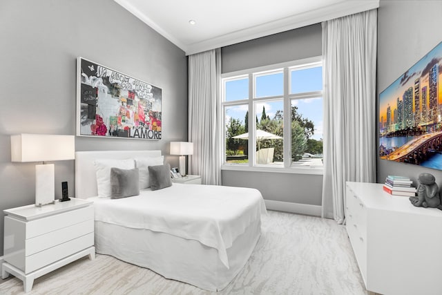 bedroom featuring ornamental molding