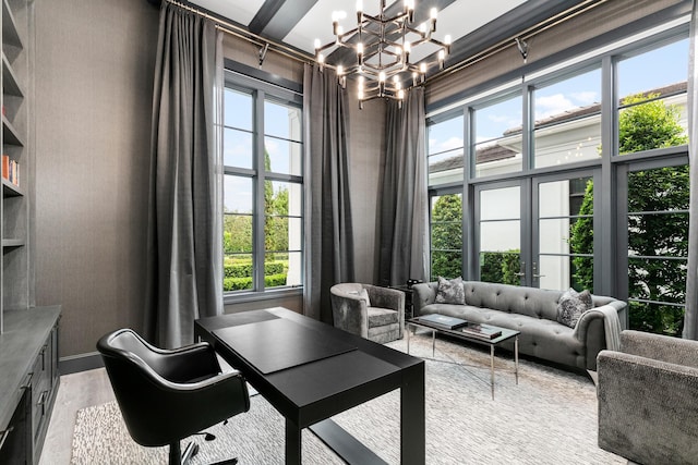 office with a chandelier and light wood-type flooring