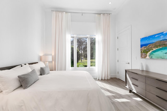 bedroom featuring light hardwood / wood-style floors