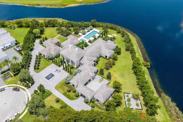 birds eye view of property featuring a water view