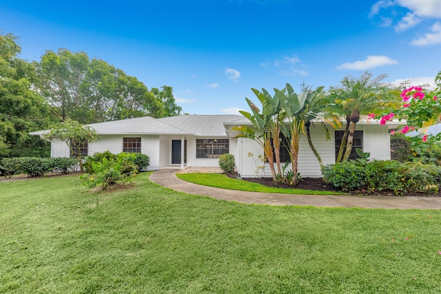 ranch-style house with a front yard