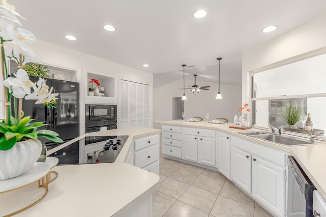 kitchen with black appliances, light tile patterned floors, sink, white cabinetry, and ceiling fan