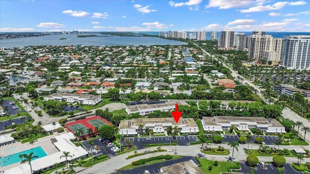bird's eye view featuring a water view and a view of city