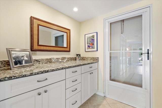 bathroom featuring vanity, separate shower and tub, and tile patterned flooring