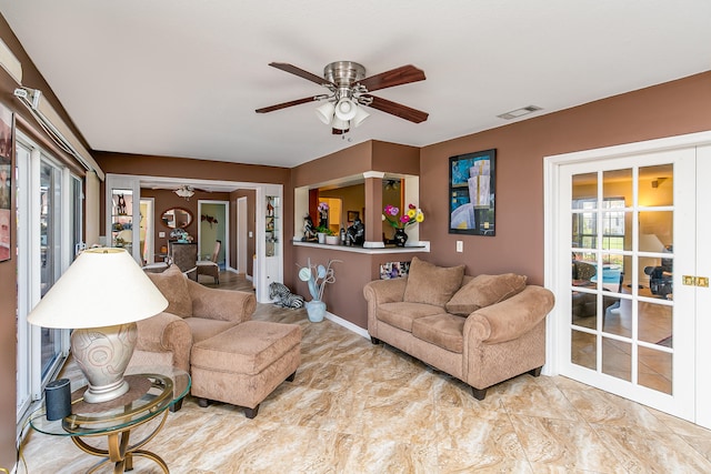 living room with ceiling fan