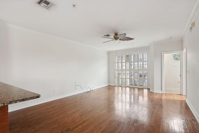 unfurnished living room featuring crown molding, hardwood / wood-style floors, and ceiling fan