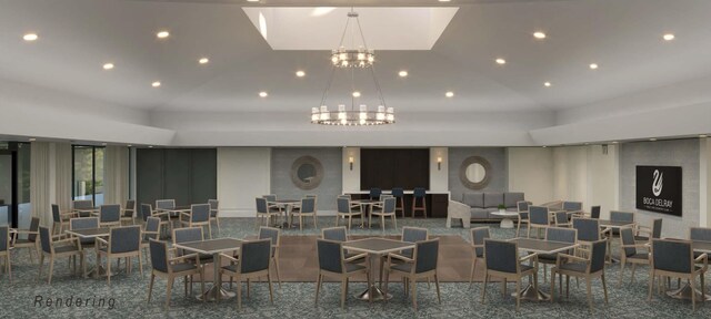 dining space with lofted ceiling and a chandelier