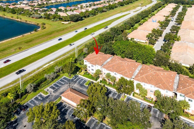 drone / aerial view with a water view