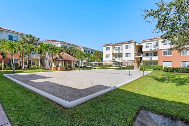 view of community featuring a gazebo, volleyball court, and a yard