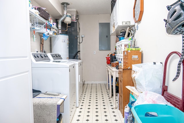 laundry room featuring electric panel, washer and clothes dryer, and gas water heater