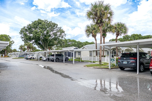 view of parking featuring a carport