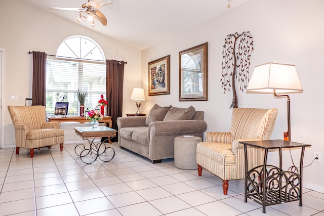 tiled living room featuring lofted ceiling and ceiling fan