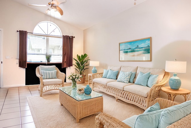 tiled living room with ceiling fan and lofted ceiling