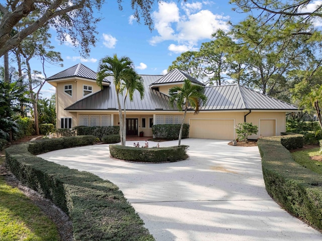 view of front of home with a garage