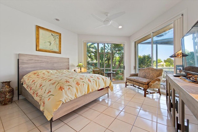 tiled bedroom with access to outside and ceiling fan