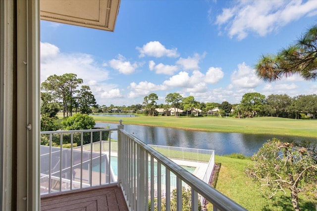 balcony featuring a water view