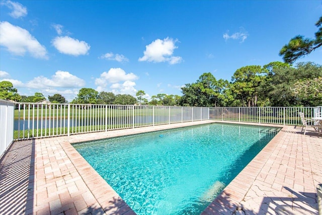 view of swimming pool featuring a patio