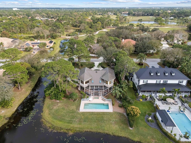 drone / aerial view with a water view