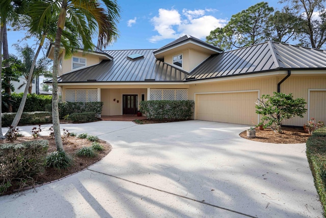 view of front of property with a garage