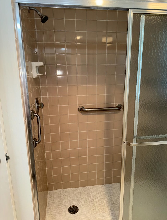 bathroom with an enclosed shower