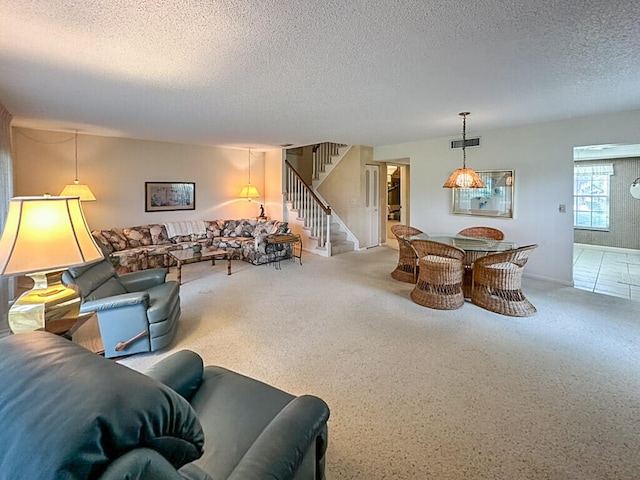 living room featuring a textured ceiling