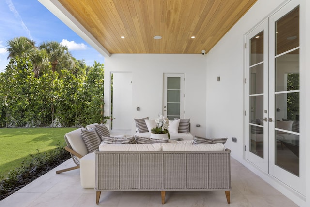 view of patio with an outdoor living space and french doors