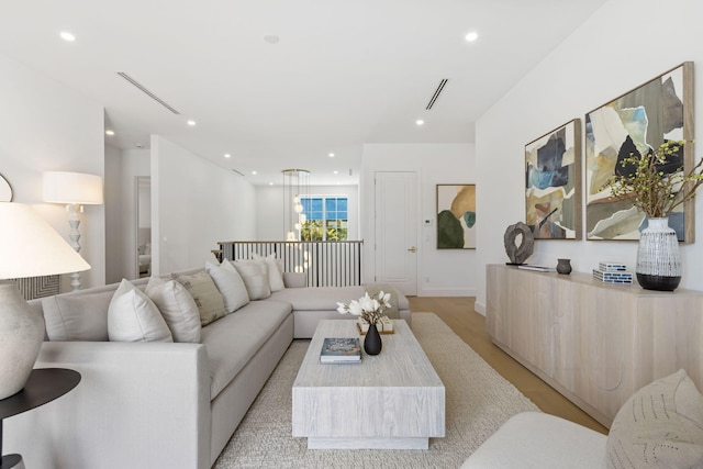 living room with light hardwood / wood-style floors