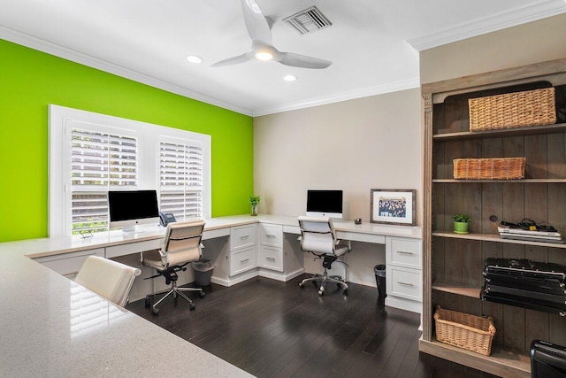 office area featuring crown molding, ceiling fan, dark hardwood / wood-style flooring, and built in desk