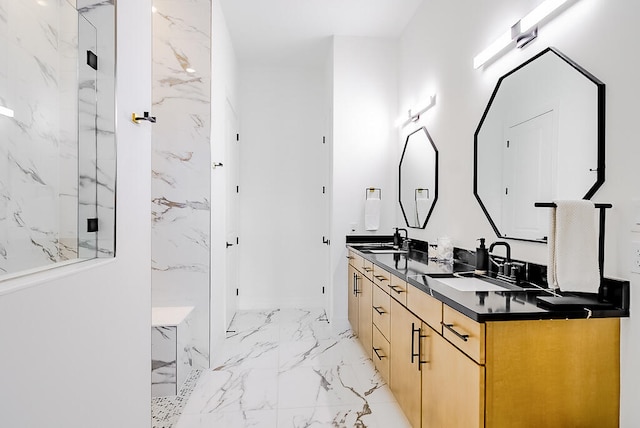 bathroom featuring vanity and an enclosed shower